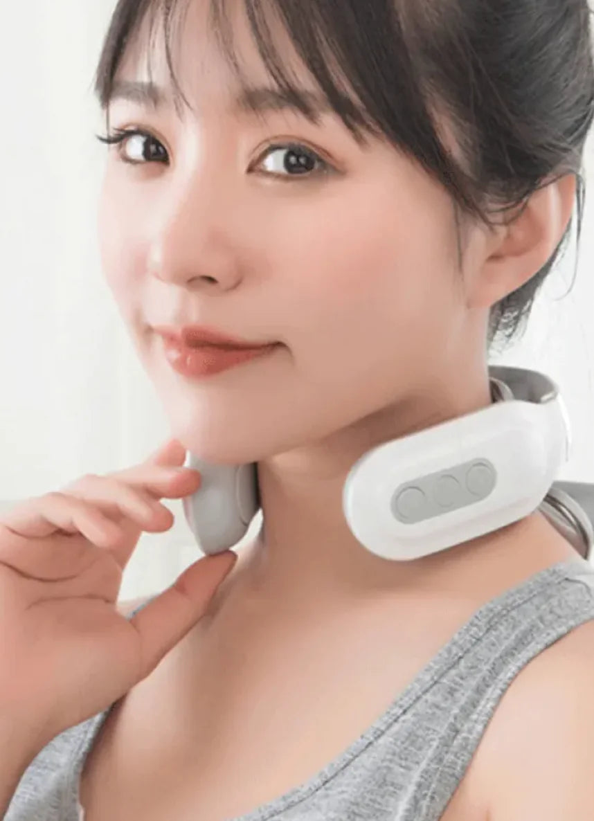 Person wearing a neck massager device for relieving neck tension and stiffness