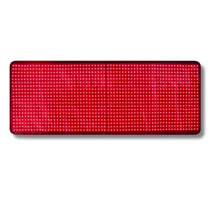 Rectangular red light therapy mat on a white background