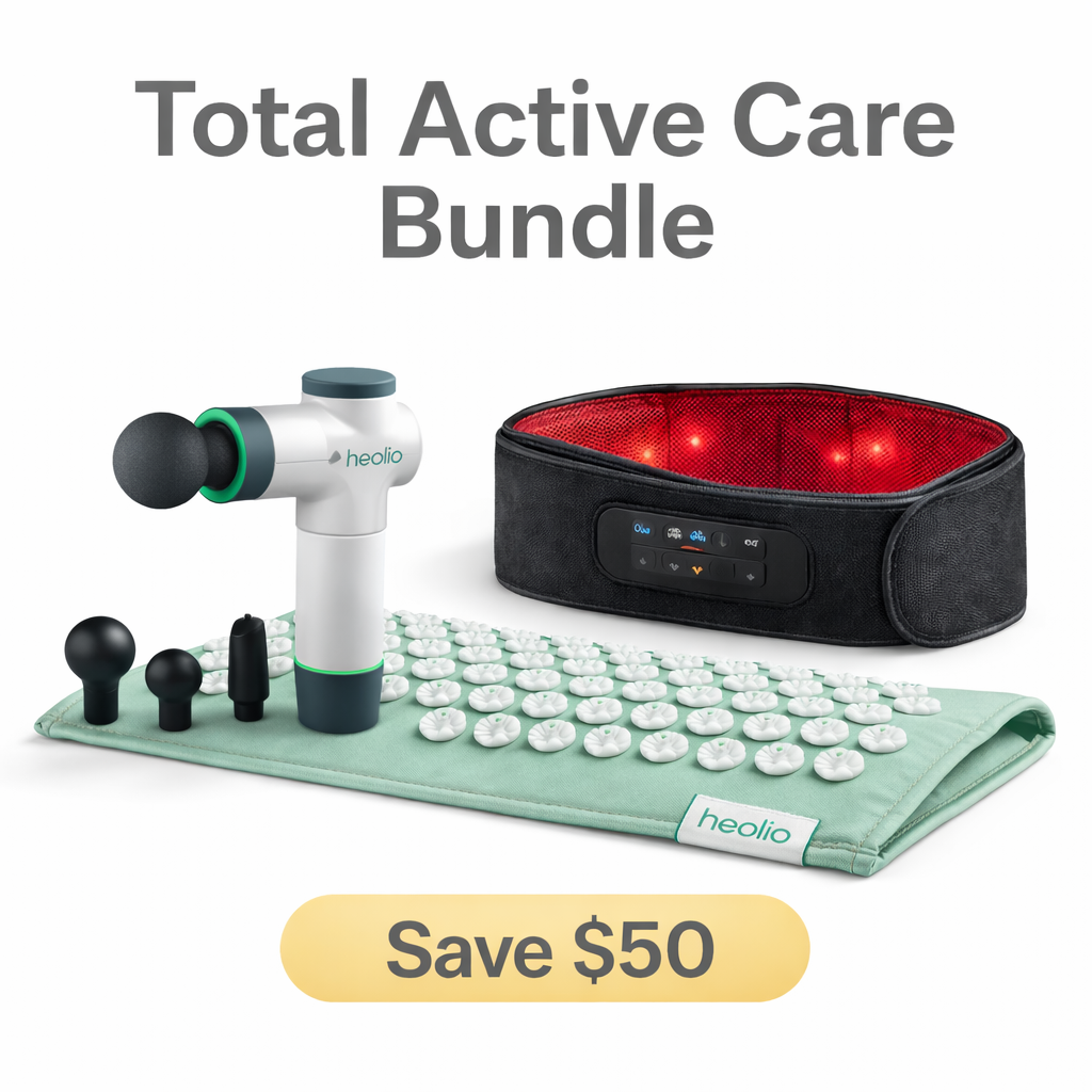 Healio Total Active Care Bundle with massage gun, acupressure mat, and light therapy device on a white background.