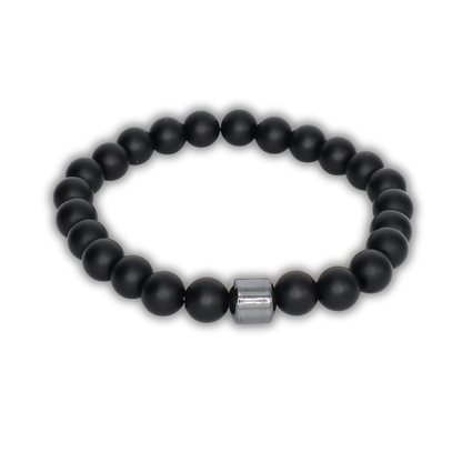 Black relaxation bracelet with a metal clasp on a white background